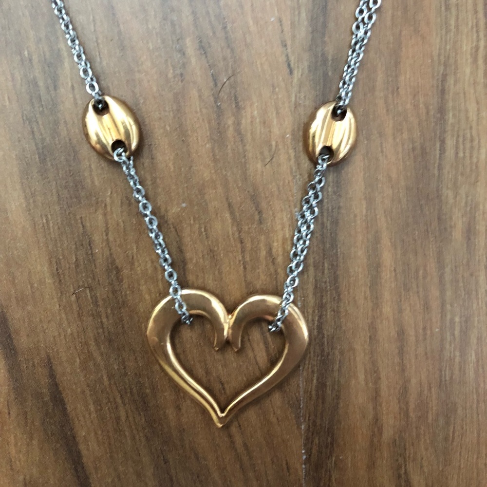 Gold tone and silver heart necklace.
